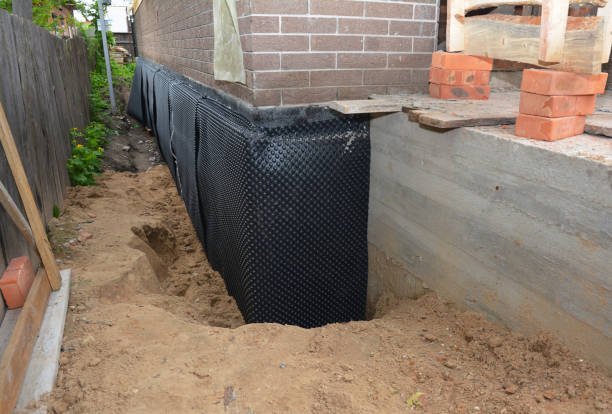 SJ Waterproofing Pros technician performing targeted Sump Pump Installation assessment in Bryans Road, MD